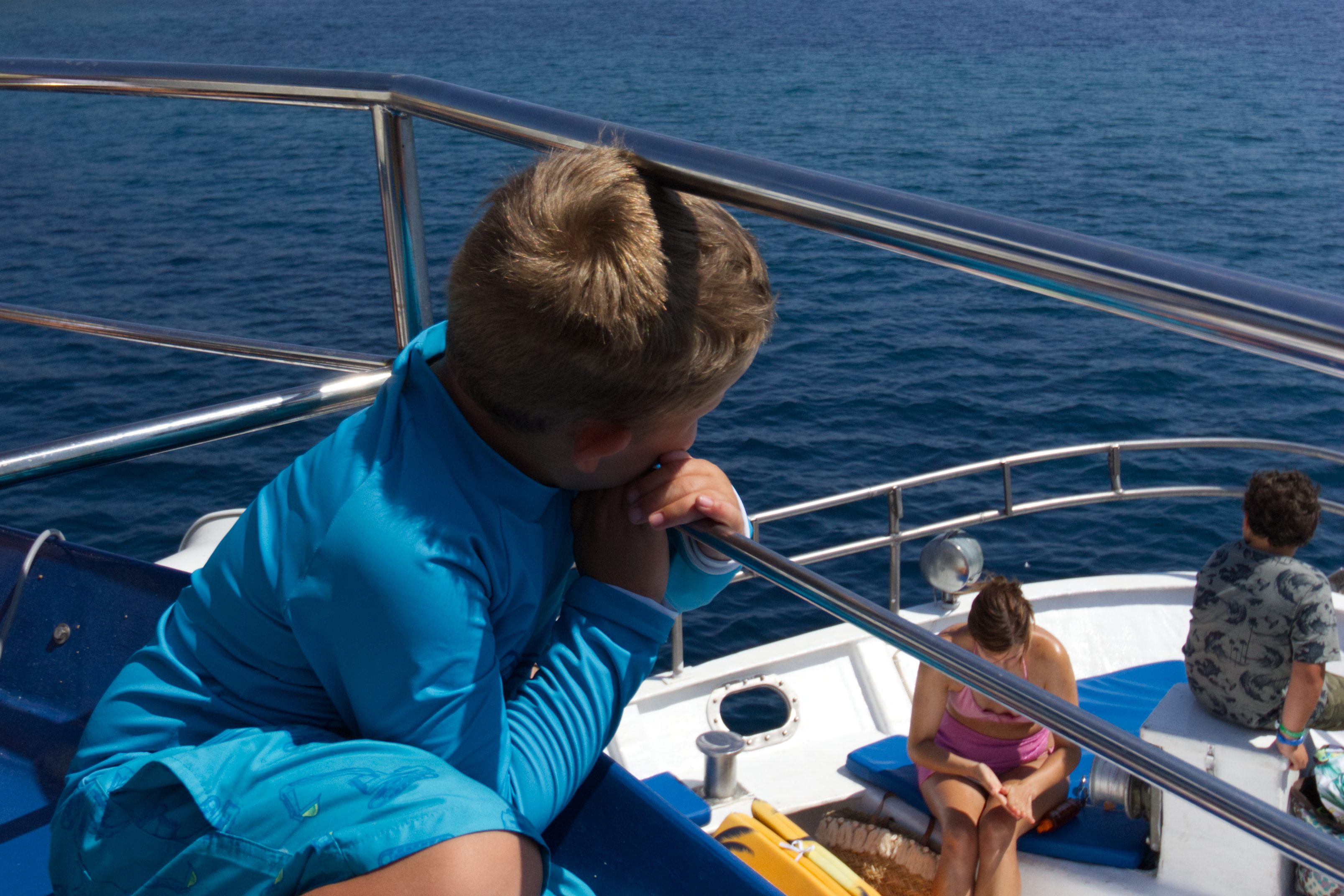 Children and families enjoying a safe boat excursion to Kornati National Park from Pakoštane, Croatia — relaxing on deck under the sun during the Adriatic cruise