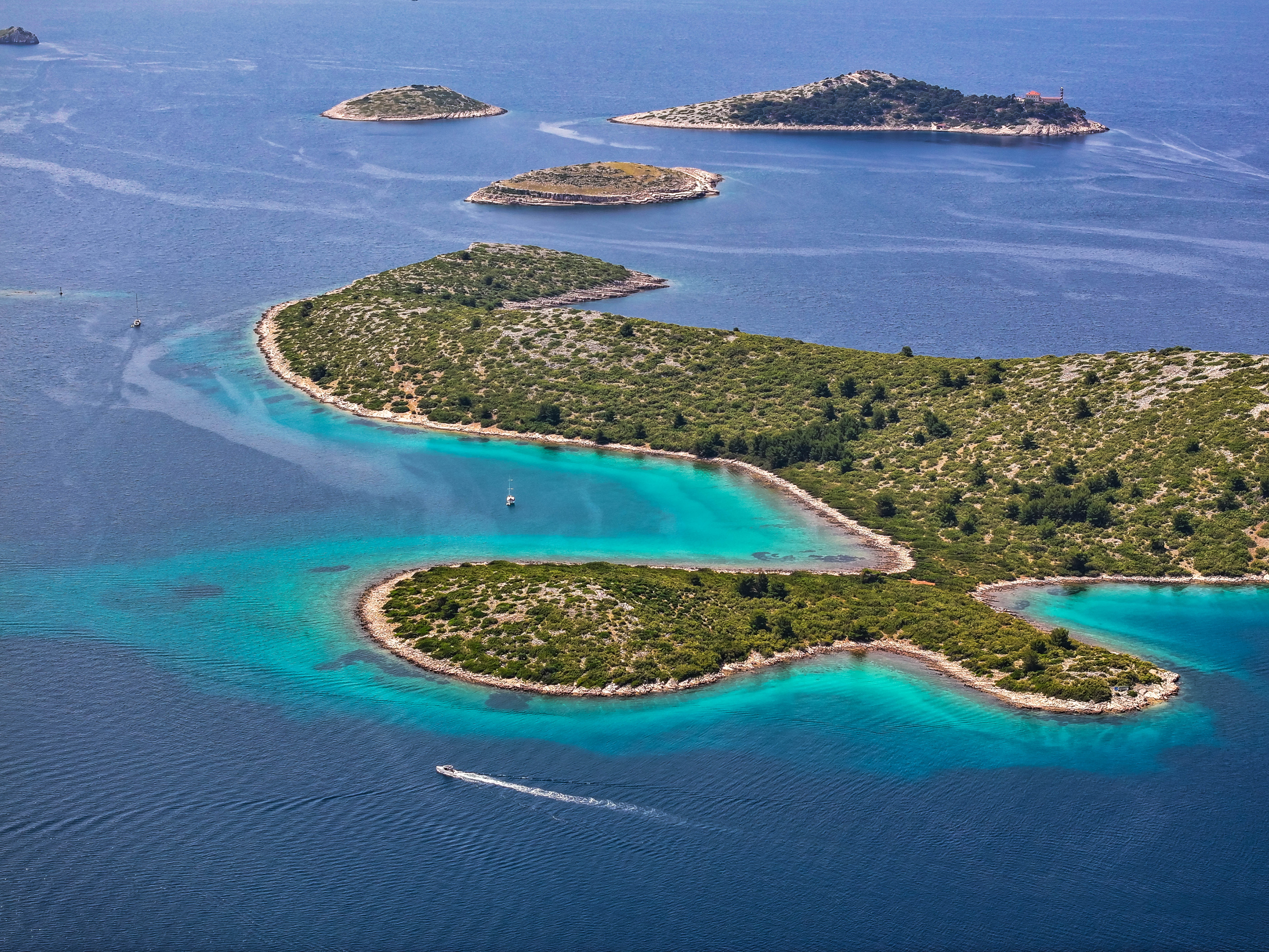 Cluster of small Kornati islands scattered across vibrant blue waters, highlighting the park’s natural labyrinth.